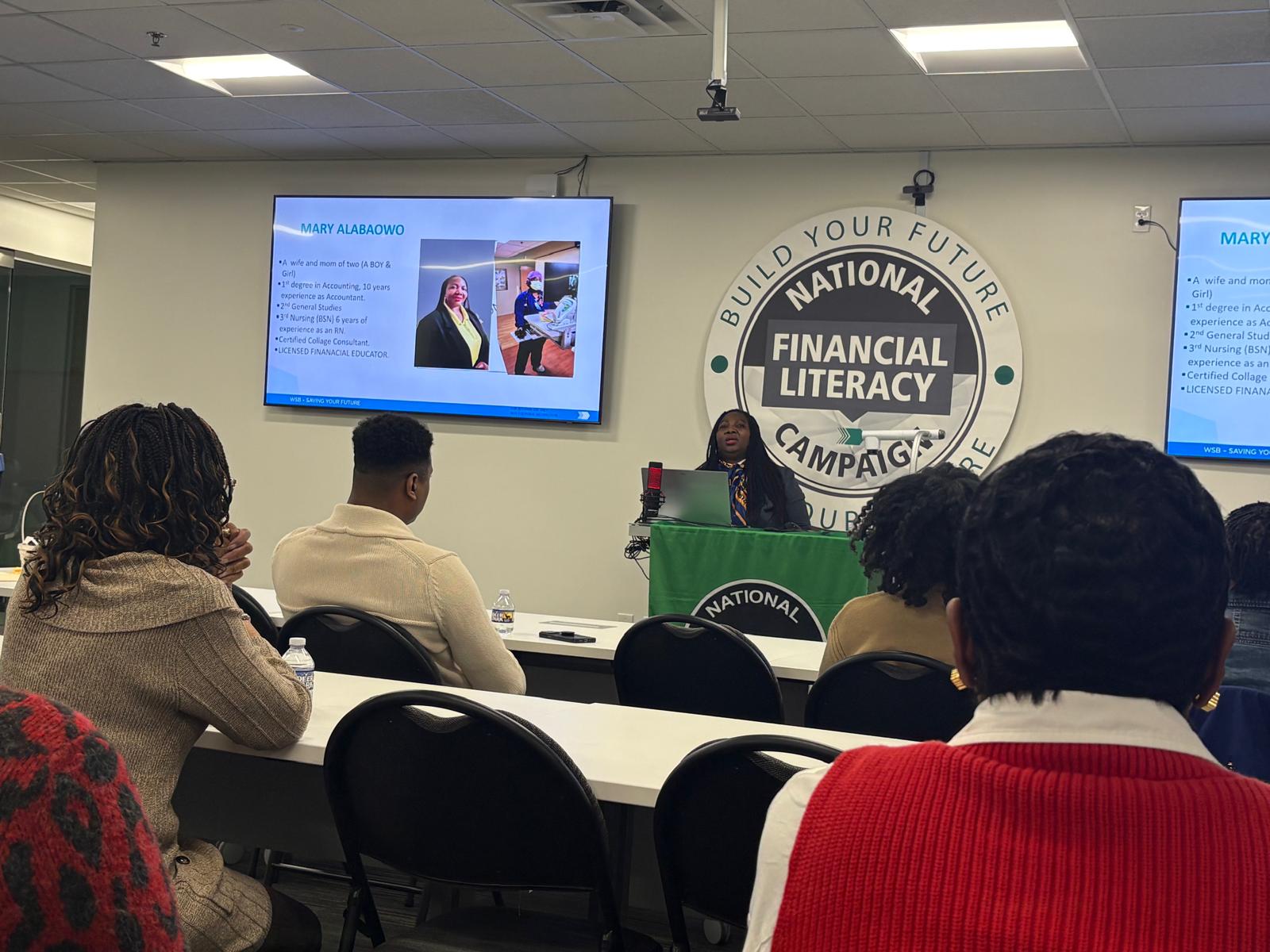 Our team speaking at financial literacy event